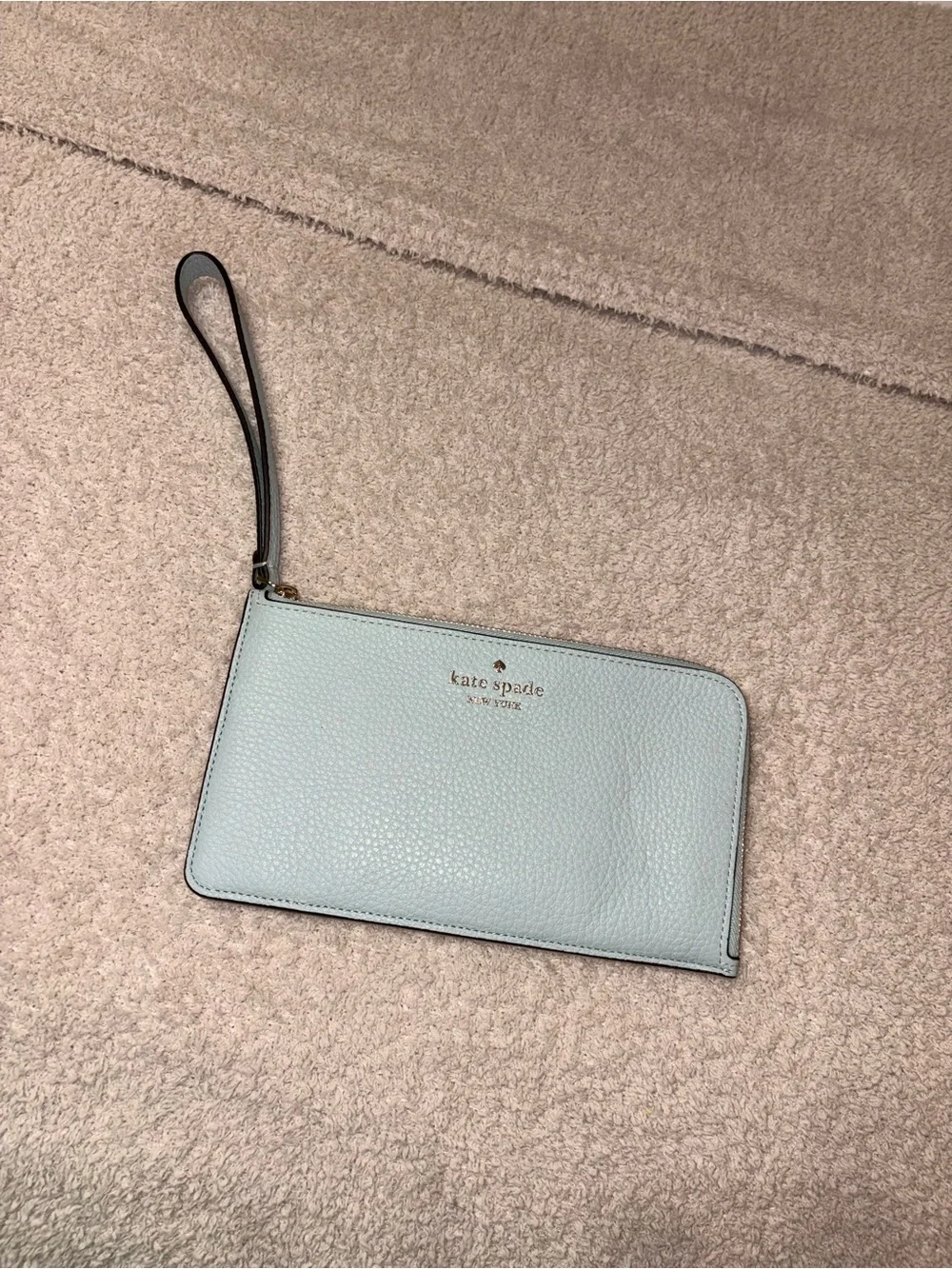 kate spade light blue pebbled leather wristlet phone case